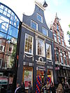 RM18969 Haarlem - Barteljorisstraat 12 - De vergulde Brasem, House with gablestone depicting a fish, Barteljorisstraat 12, Rijksmonument 18969, Haarlem